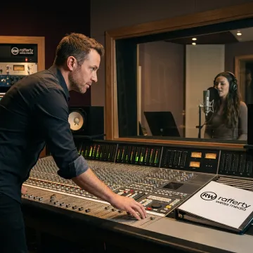 Radio commercial production studio with voiceover recording