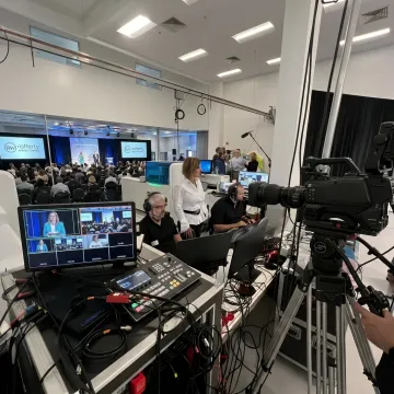 Live streaming crew producing a corporate event broadcast