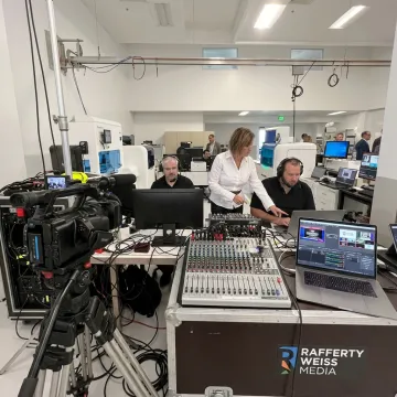 Production team managing a live webcast control station