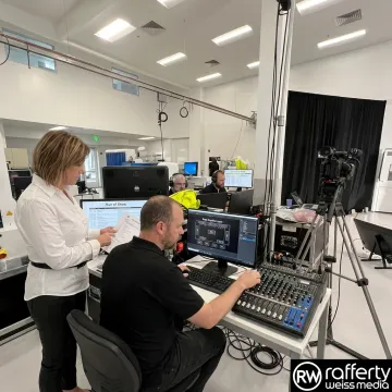 Production team coordinating a live event video setup