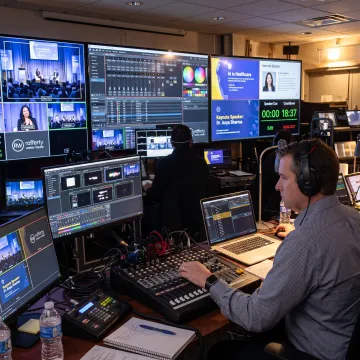 Event producer coordinating cameras and stage cues