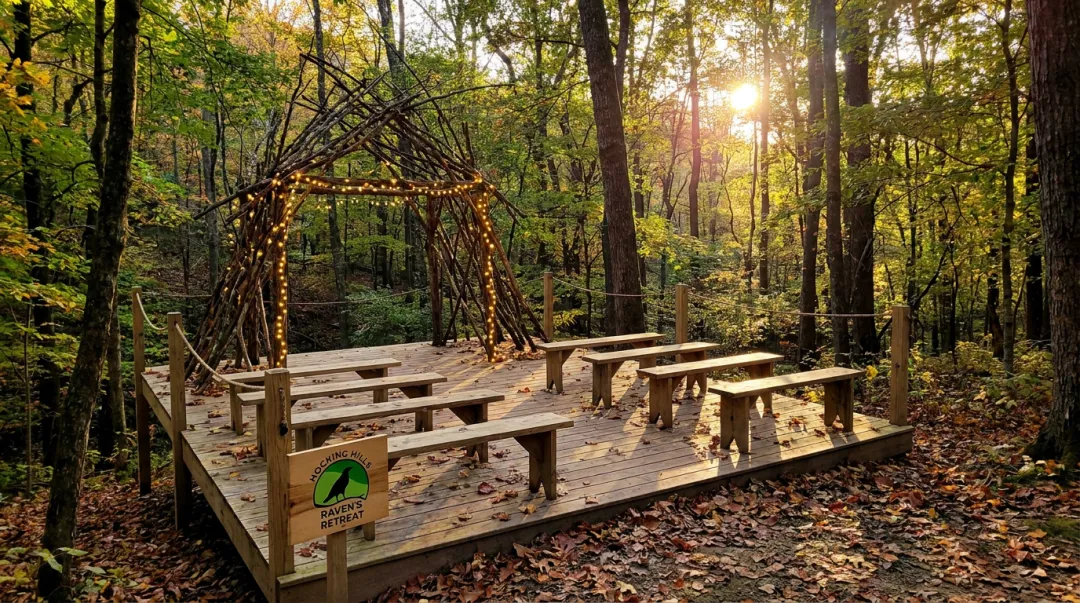 Raven's Retreat Hocking Hills elevated forest ceremony platform with rustic arch and benches