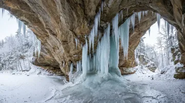 Ash Cave massive natural ice sculpture beneath recess cave drip line in winter