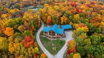 Raven's Retreat Hocking Hills private nature preserve Art Lodge exterior and hiking trails