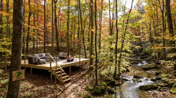 Raven's Retreat Hocking Hills forest meditation zone beside creek and woodland setting