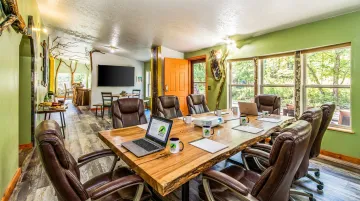 Raven's Retreat Hocking Hills Art Lodge conference space and forested nature preserve grounds