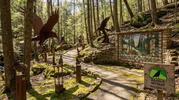 Raven's Retreat Hocking Hills steel sculpture art installation inside nature retreat property