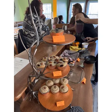 Team planning a cooking and retreat experience with a host