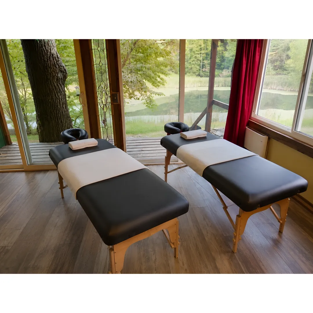Massage and hot tub setting at a couples wellness retreat