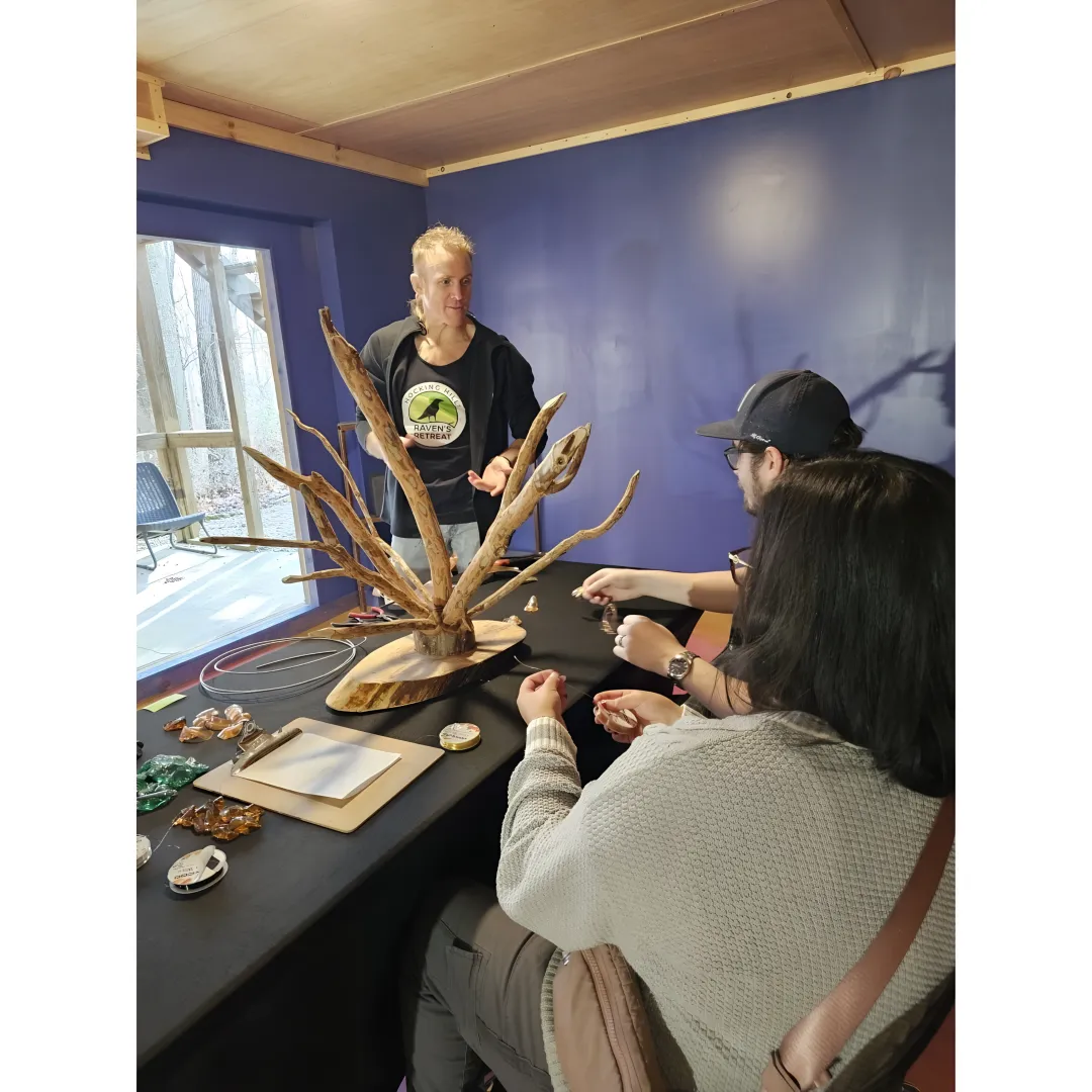 Instructor guiding adults through a creative art workshop