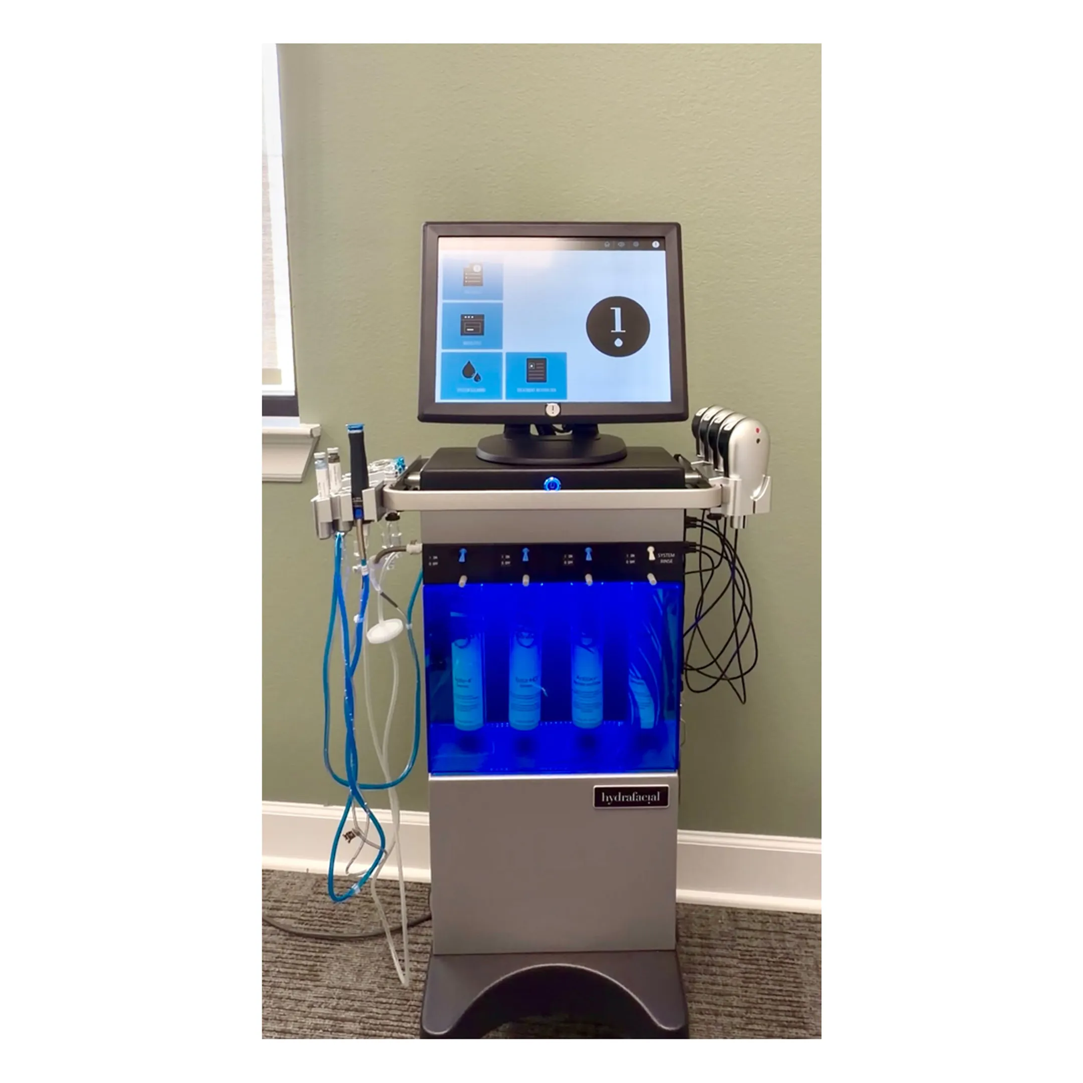 Close-up of HydraFacial wand infusing hydrating serum onto skin
