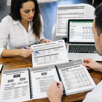 Consultants reviewing nonprofit compensation strategy