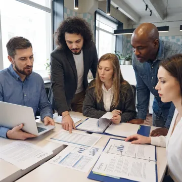Nonprofit consultants reviewing strategy plans
