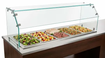 Health code compliance inspection with food service sneeze guard barrier installed
