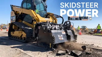 Rolling Wedge milling attachment drum installed on skid steer