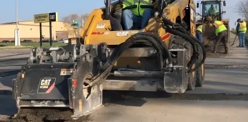 Rolling Wedge drum technology cutting asphalt concrete and rebar in single pass