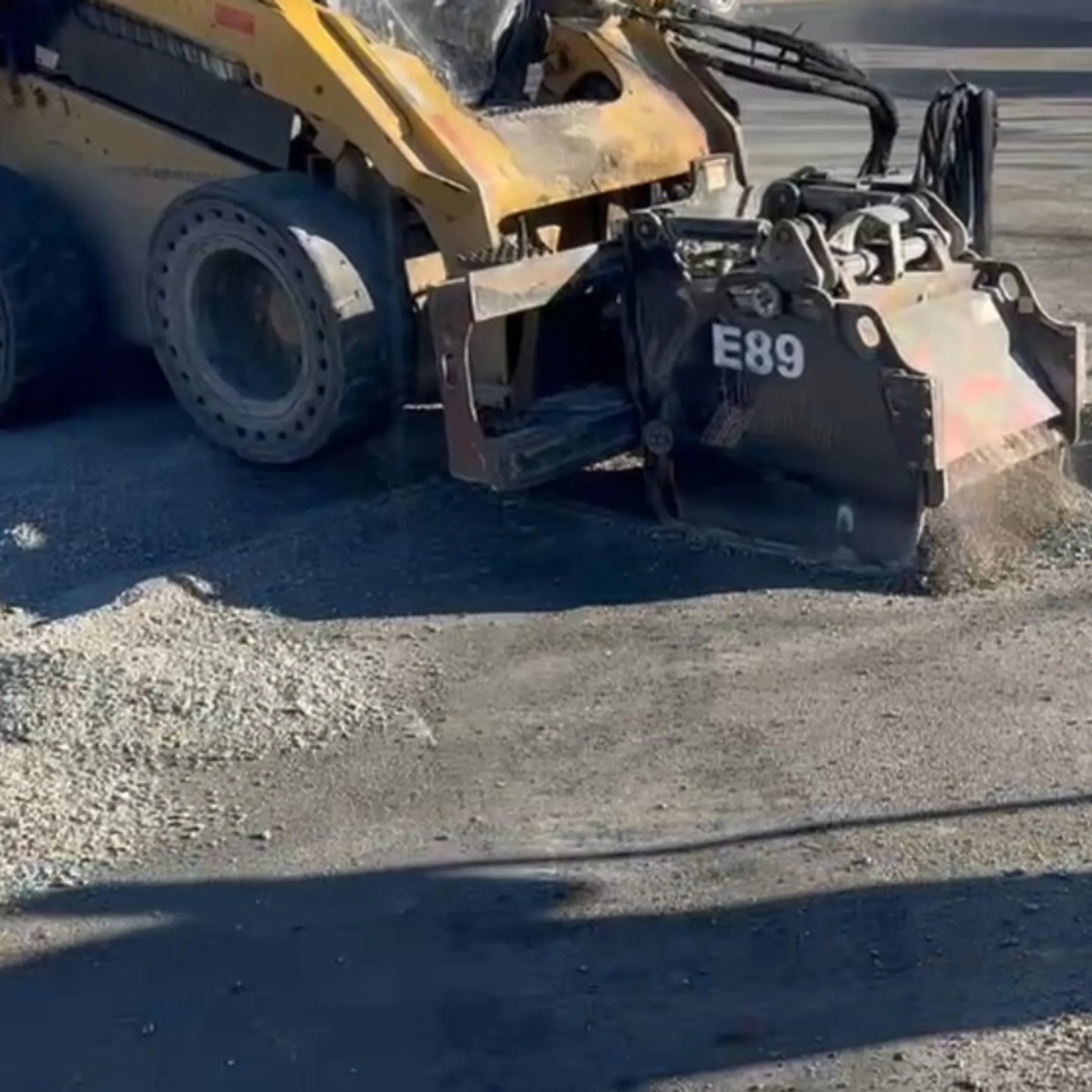 Precision milling tool cutting asphalt and concrete