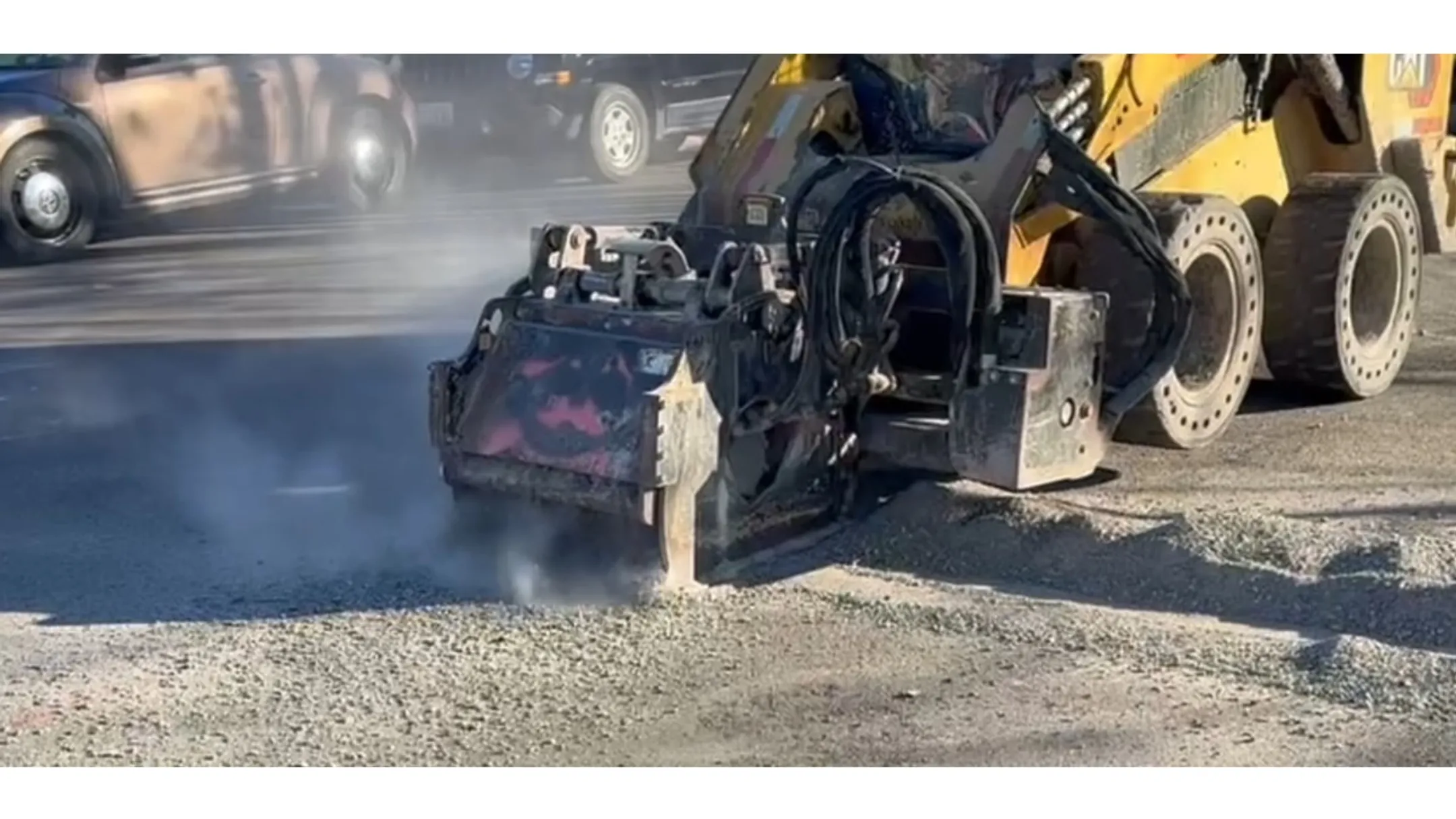 Rolling Wedge milling attachment drum installed on skidsteer