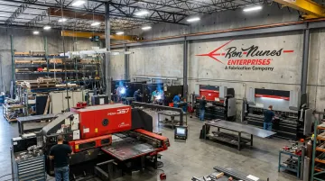 Contract manufacturing facility floor with CNC press brake and welding stations