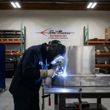 Aluminum welding in precision metal fabrication shop