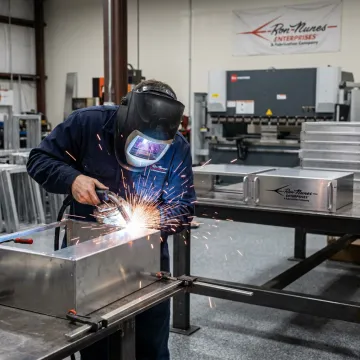 Welder joining precision sheet metal parts