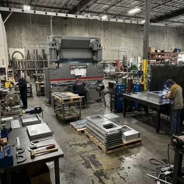 Custom metal fabrication shop with laser cut parts