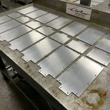 Finished precision metal parts on a production table