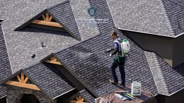 Roof Guard Pro technician applying GoNano Shingle Saver treatment to roof