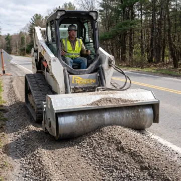 Road widener attachment preparing a roadside surface