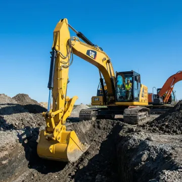 Modern excavator performing foundation excavation work on a construction site in Fredericksburg, VA