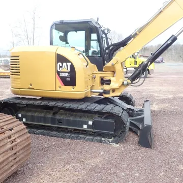 Heavy earthmoving machine operating on rocky construction site in Sullivan County