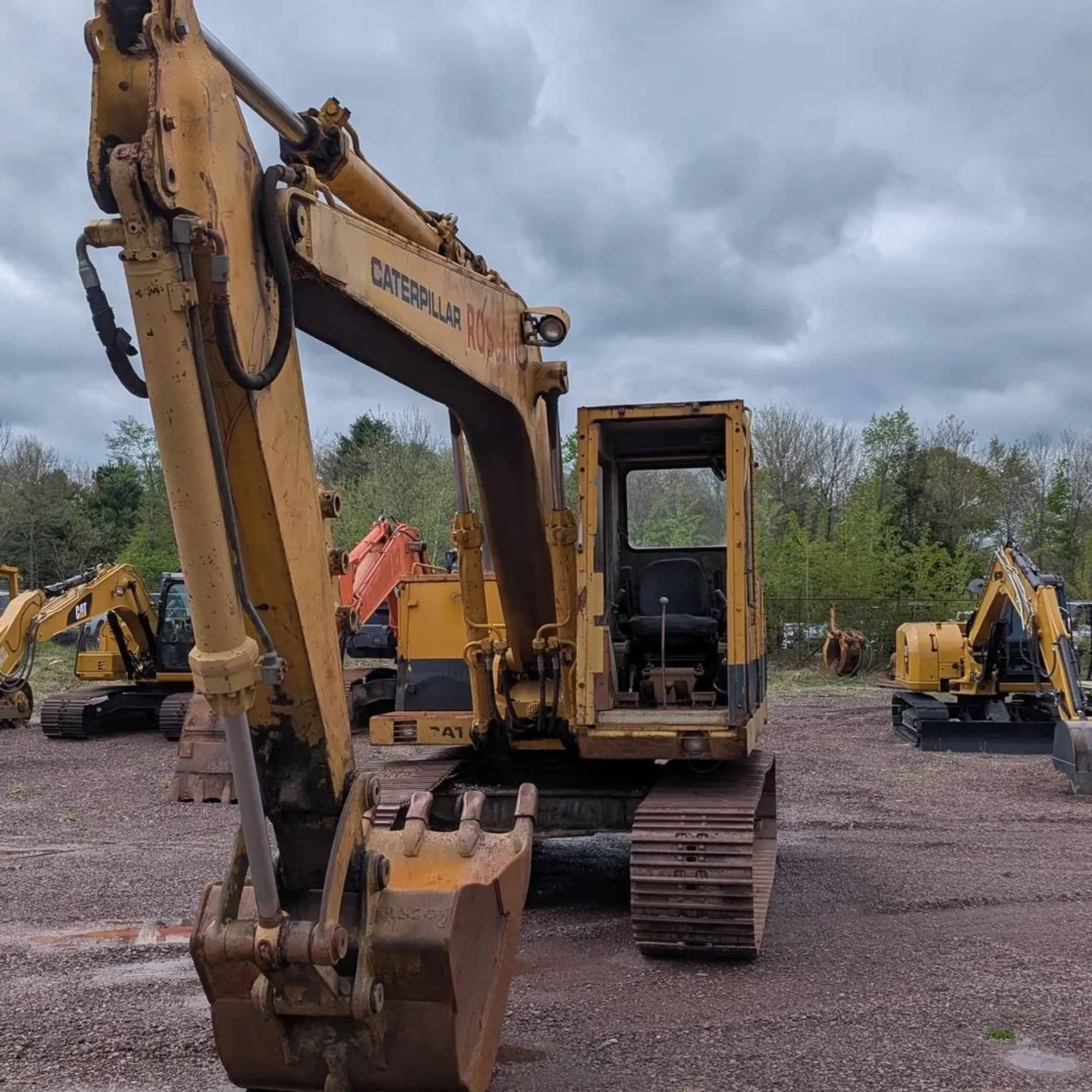 Heavy construction equipment including earthmoving machines and skid steers at a Callicoon NY job site
