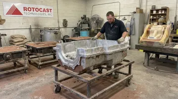 Sand casting rotational mold with engineered parting line placement during foundry production