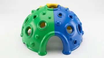 Complex rotomolded playground tunnel system with organic curves undercuts and themed design