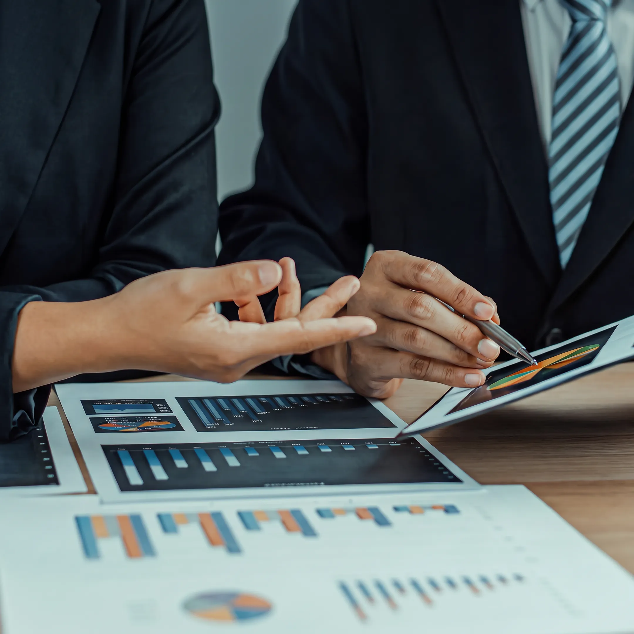 Advisor presenting a business valuation and transaction strategy to a client