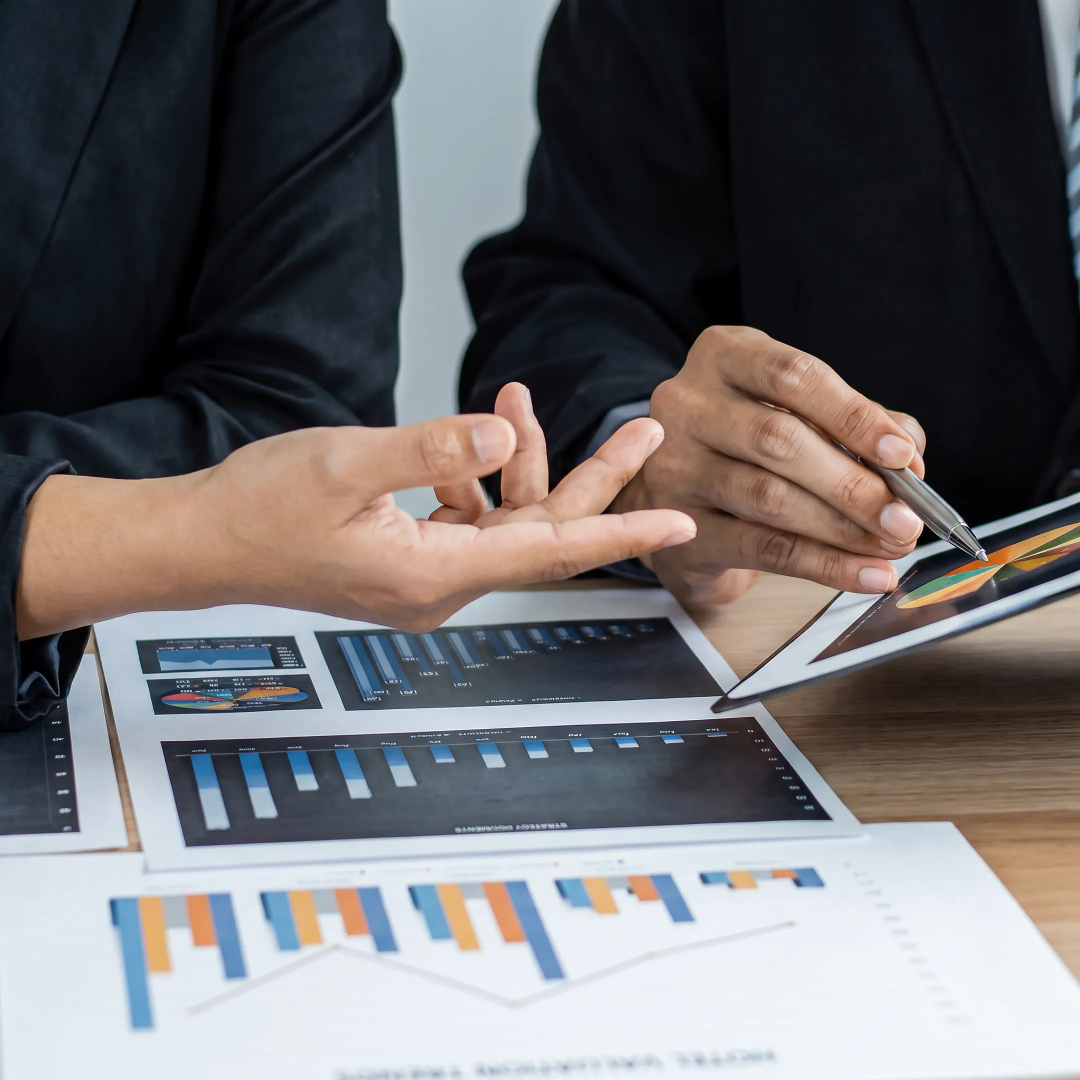 Business advisor presenting hotel valuation analysis to an owner