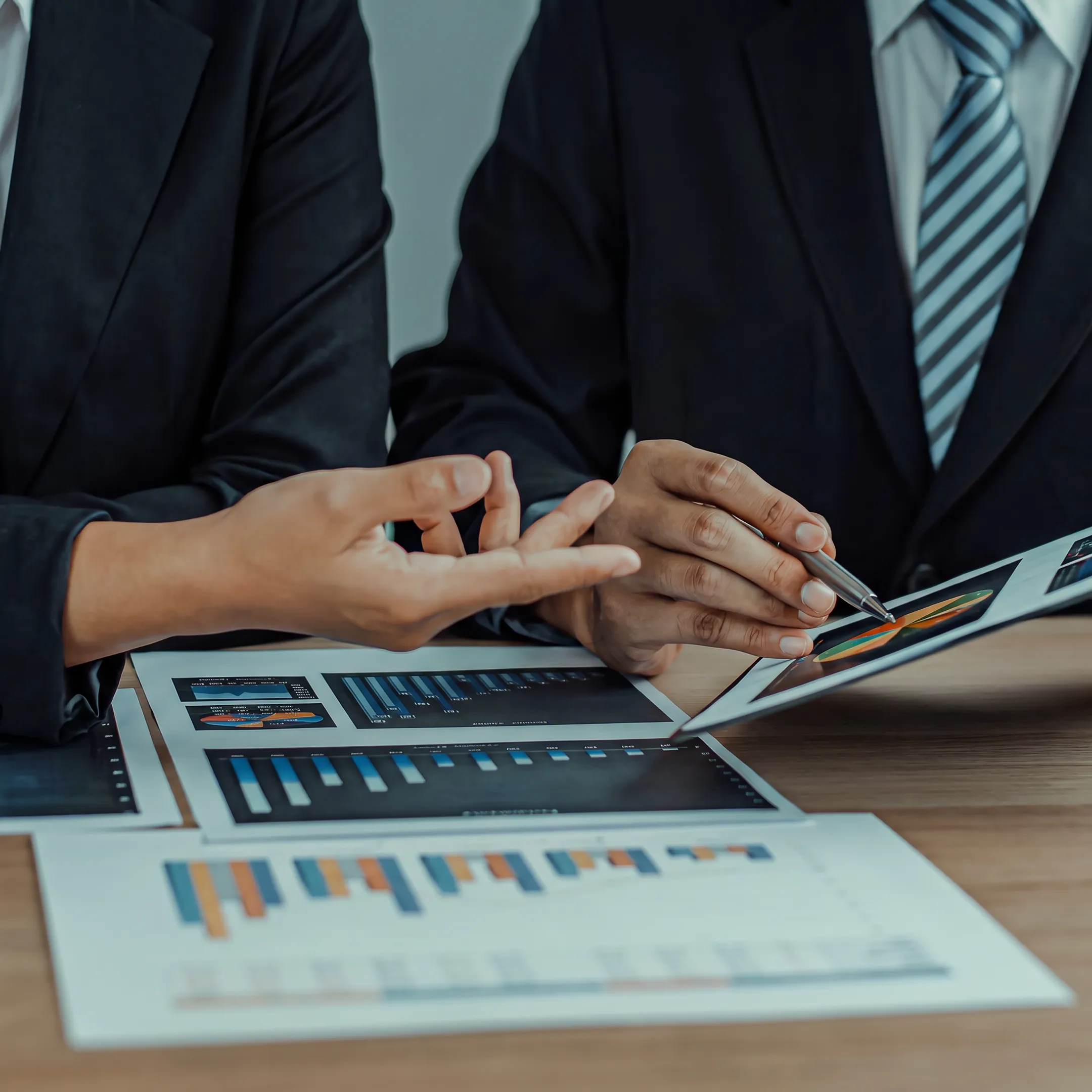 Advisor presenting engineering business valuation findings to an owner