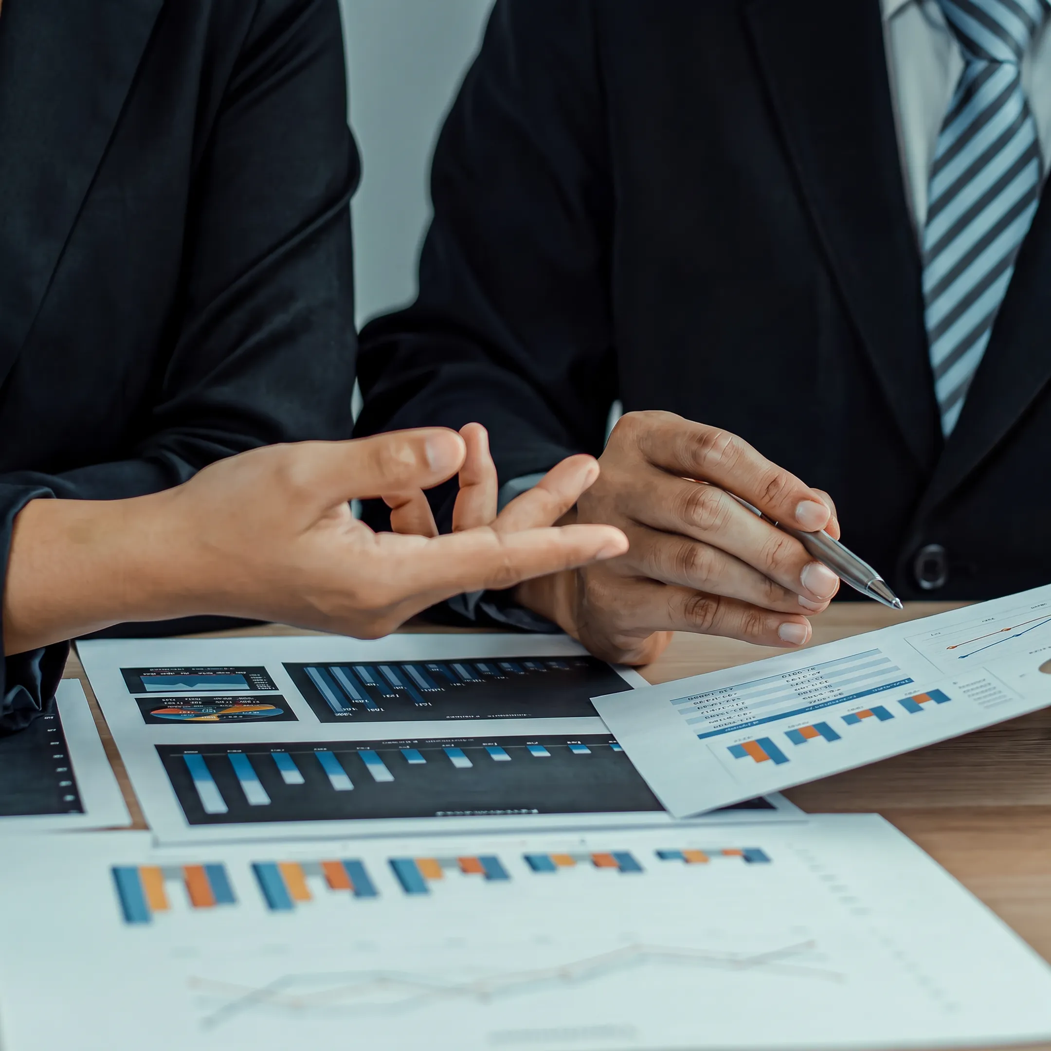 Business advisor presenting valuation analysis to an entrepreneur