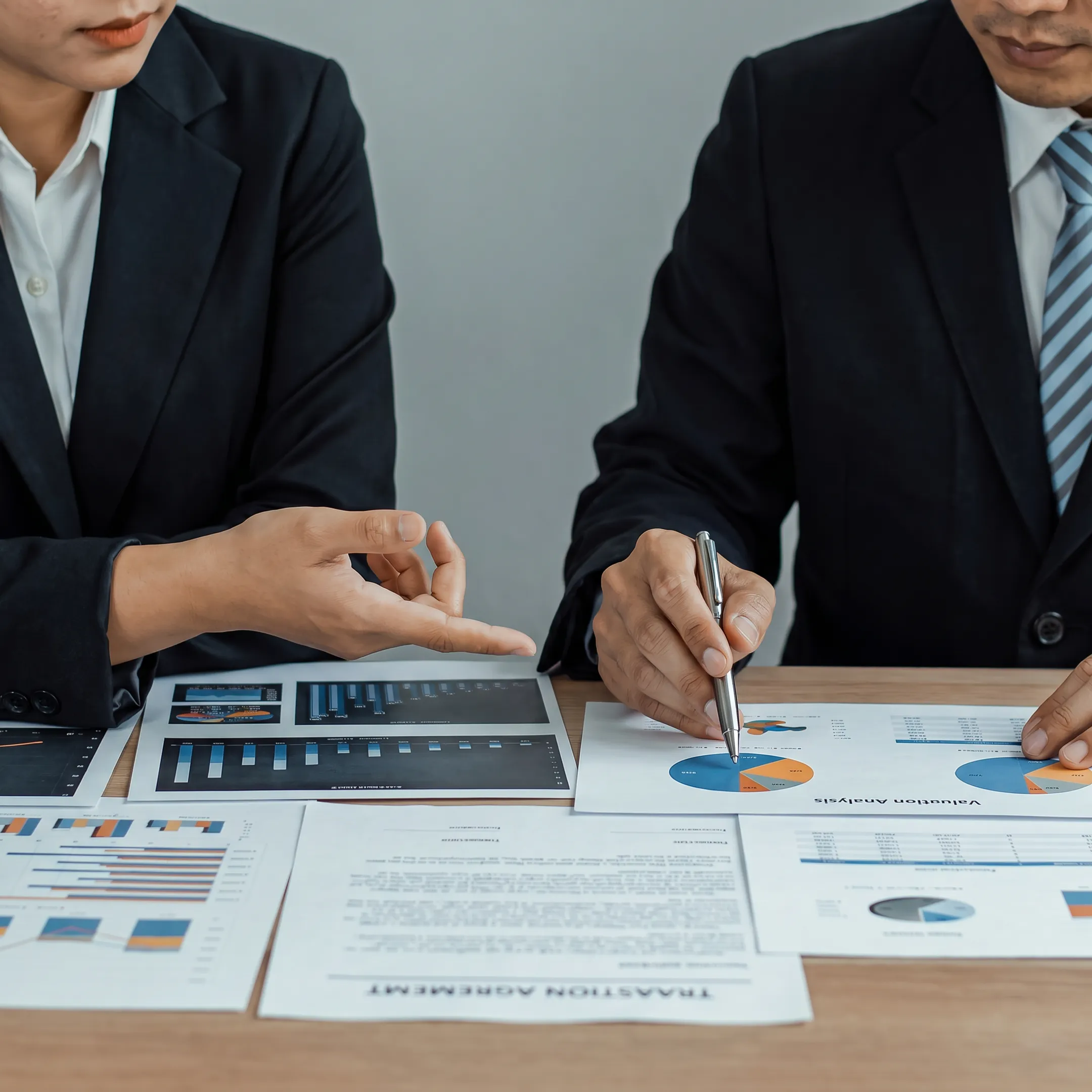 Business advisor presenting valuation analysis to a business owner