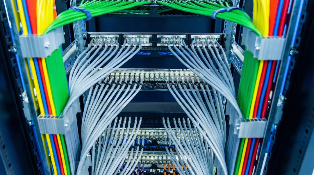 Business fiber internet server room with active network equipment and cable infrastructure
