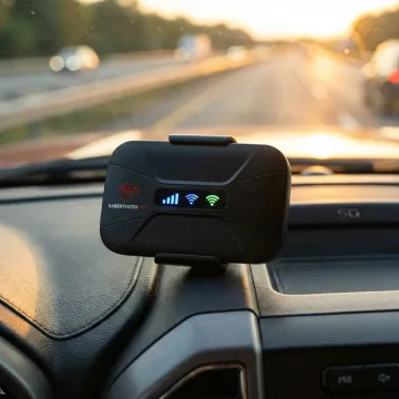 Modern mobile hotspot device mounted in truck cab with signal strength indicators