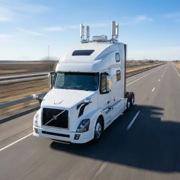Commercial truck with mounted 5G connectivity equipment on highway