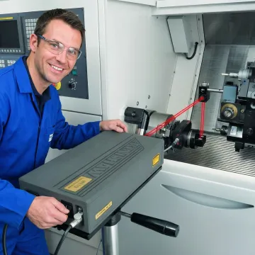 Precision laser interferometer measuring rotary axis balance on CNC machine