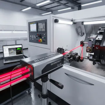 Precision laser interferometer calibrating CNC machine in Idaho manufacturing facility