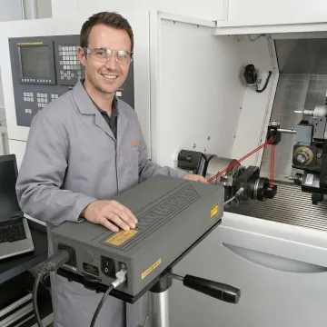 Precision laser calibration equipment measuring CNC machine accuracy