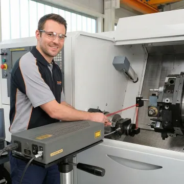 Precision laser interferometer measuring CNC machine axis accuracy