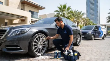 Mobile car wash technician cleaning wheels with eco-friendly products