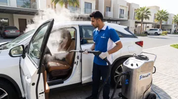 ScrubUp mobile technician steam cleaning car interior in Dubai parking area