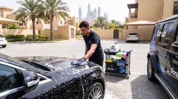 ScrubUp mobile technician hand-washing ceramic coated car with foam