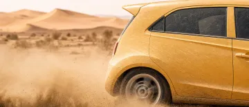 Sand and dust accumulation causing swirl marks on car paint surface